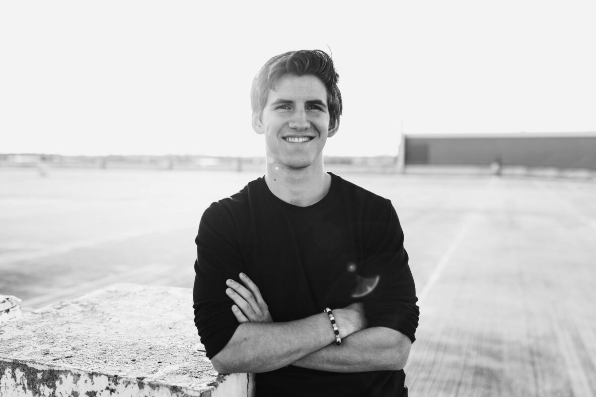 black and white image showing boy for inspiration for a parking garage senior session