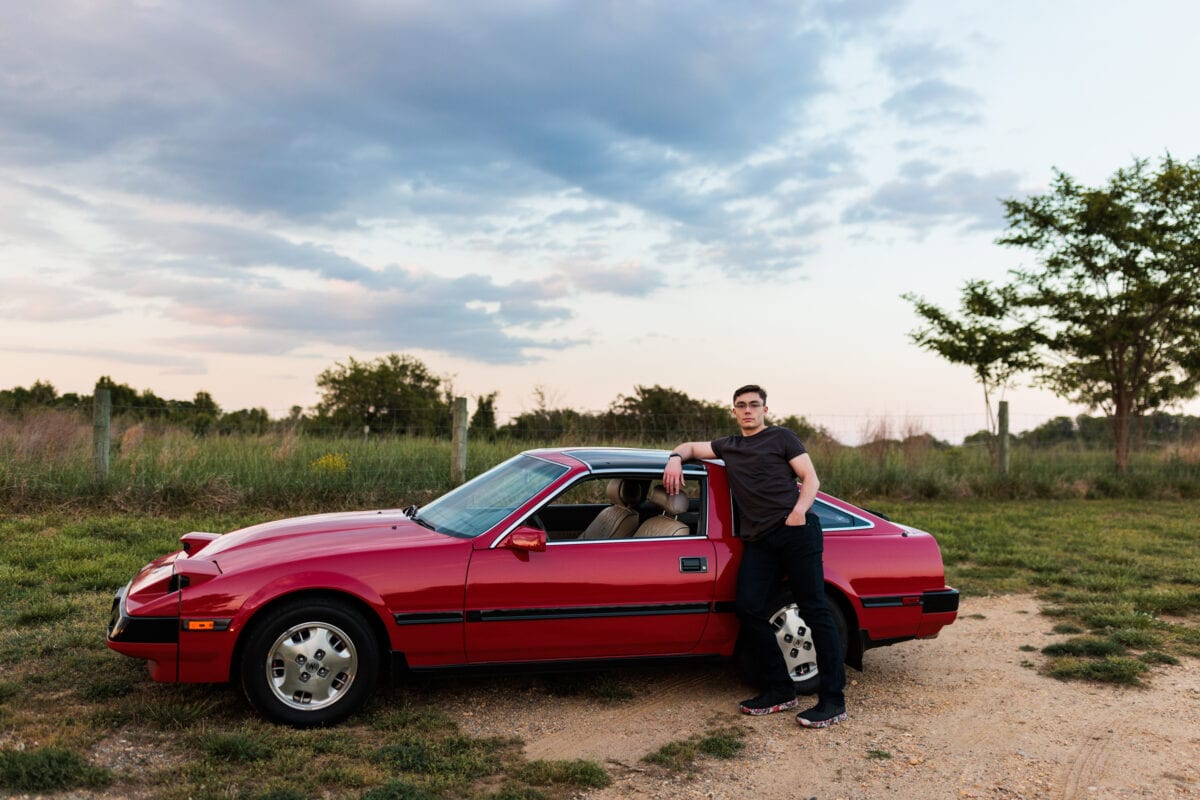 high school senior with old car for client superlative awards