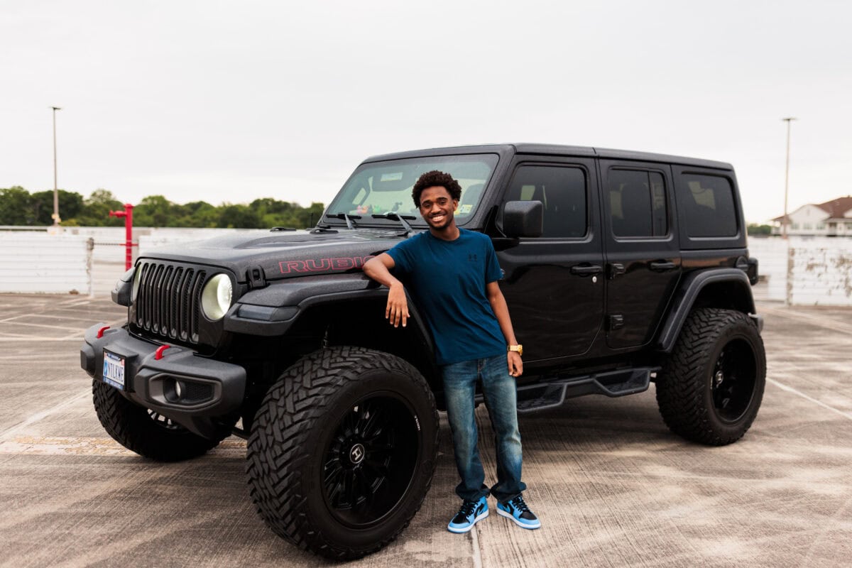 senior boy with jeep for photo session